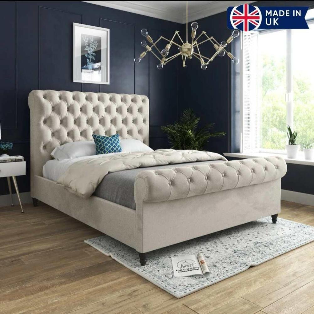 Cream velvet double bed with a tufted headboard in a stylish bedroom.