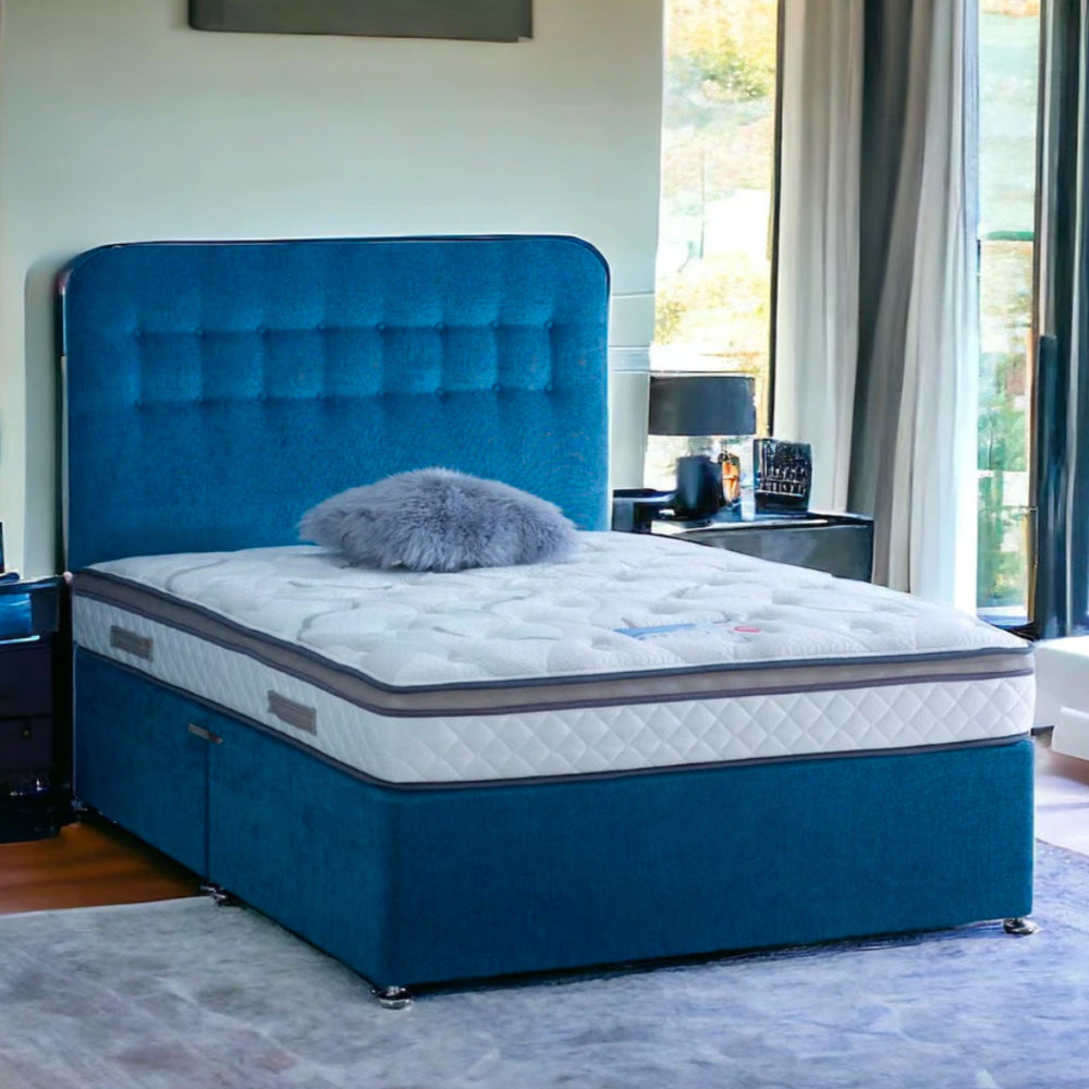 Bedroom with a deep blue bed featuring the Majestic Gel 1000 mattress.